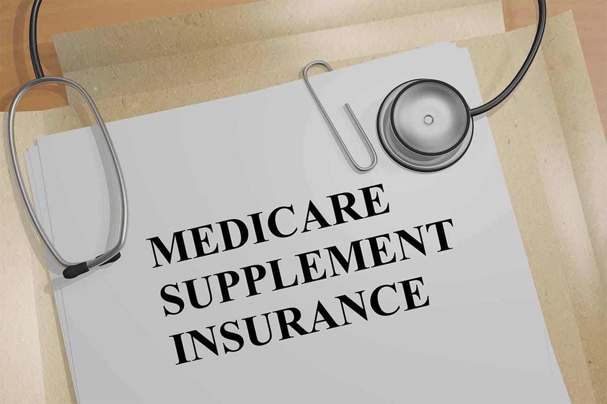 1 A paper that has medicare supplement insurance written on it.